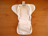 All Grow with Me Diapers come include a snap in doubler for quicker drying.